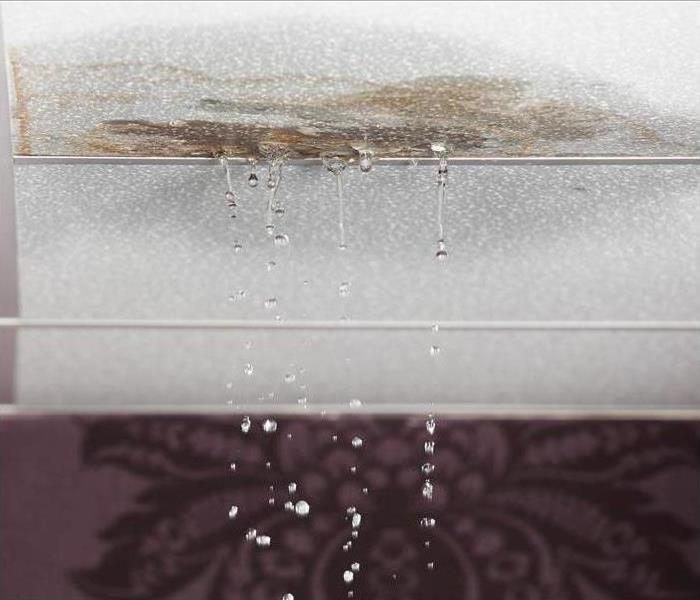 water leaking through wallboard